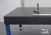 Welding table with holes